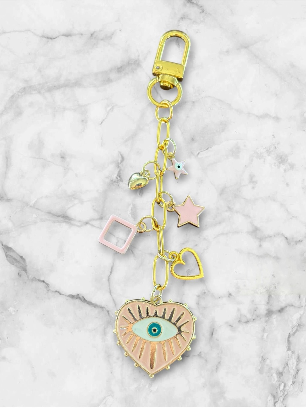Gold Tone Eye Heart Charm Keychain with Pink Accents